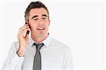 Business manager making a phone call against a white background