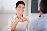 Candidate listening to her future manager in his office