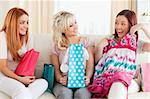 Cute Women with shopping bags in a living room