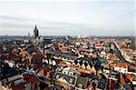 The historic university city of Delft, the netherlands, with the old church and "het Prinsenhof in clear view on the left