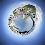 Living in your own world makes life simple and pleasant. A spherised manipulation of a panoramic stitch from 34 images of the arctic fishing village of Husavik, Iceland