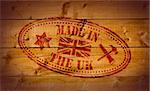 Made in The UK rubber stamp on wooden background. Also available as a Vector in Adobe illustrator EPS format, compressed in a zip file