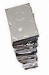 stack of hard drives on white background. Top view with selective focus.