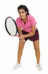 Photo of a attractive female tennis player waiting for the serve.  Full body shot with slight shadow around shoes.