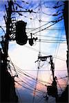 Silhouette of power lines at dusk