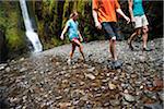 People Hiking in Oneonta Gorge, Oregon, USA