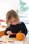 Girl Carving Pumpkin, Portland, Multnomah County, Oregon, USA