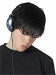 isolated teen listening to music with expression