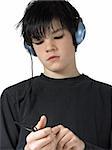 isolated teen with mp3