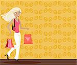 Stylish blonde with shopping bags in hand