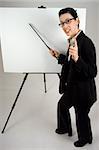 Female presenter with blank presentation whiteboard