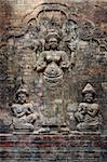 A carved brick wall in the Angkor temples in Siem Reap, Cambodia