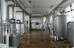 stainless steel pipes and tanks in dairy food production plant