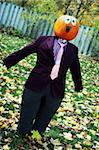 Pumpkin person in a suit. Celebrating the start of the harvest season and Halloween in Canada.