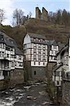 Historic center of Monschau at the Rur river. Above the city is the castle Monschau, which dates back to the 13th century.