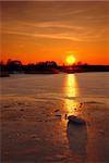 Winter sunset on a frozen lake