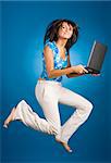 jumping happy woman with laptop