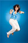 jumping happy woman with cell phone