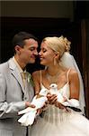 The groom and the bride with white pigeons