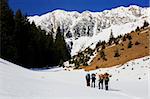 Alpinists towards Piatra Craiului Mountains, Romania.