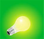 yellow light bulb with green background