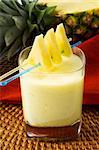 A glass of pineapple smoothie