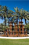 Palm Trees and waterfall in Elche Murcia, Spain.