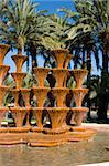 Palm Trees and waterfall in Elche Murcia, Spain.