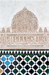 Detail of Islamic script on a wall at the Alhambra, Granada.
