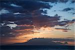 Sunset clouds over the coast of Kihei, Maui, Hawaii, USA.