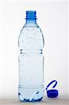 bottle with water on white background