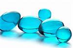 An abstract picture of vitamins pills in cyan color