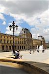 Building of Louvre museum on summer day in Paris, France