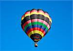 Hot Air Balloon Isolated in the Blue Sky