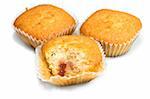 Three tasty muffins isolated on white background.