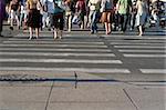 Pedestrians crossing a street of big city