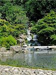 Traditional Japanese Kyoto gardens with big lake