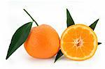 Mandarine oranges with fresh green leaves