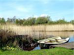 A small bat moored at Brynrefail, Snowdonia, North Wales.