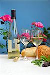 White wine with glasses on blue background