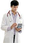 Doctor or healthcare worker using portable hard drive to access medical software.