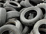A heap of discarded car and truck tires.