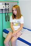 Young girl waiting in doctor's office