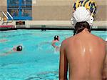 A water polo game from the bench