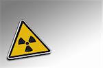 Radioactive warning sign over gradient background - including clipping path for the warning sign