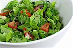 green salad in a bowl, shallow DOF