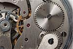 old watch - the device. The internal mechanism of watch - a photo close up