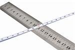 White metal ruler and measuring tape on a white background