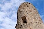 Old stone tower in Dolce Aqua Castle. Liguria. Italy