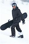 Black snowboarder